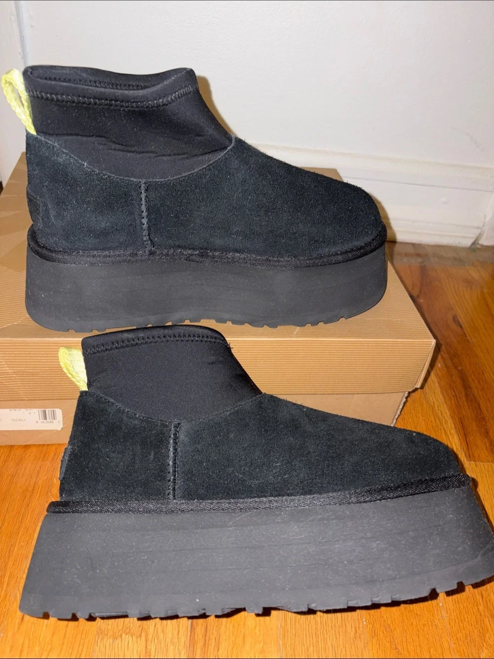 UGG Black Suede Platform Ankle Slip-On Boots with Yellow Pull Tab